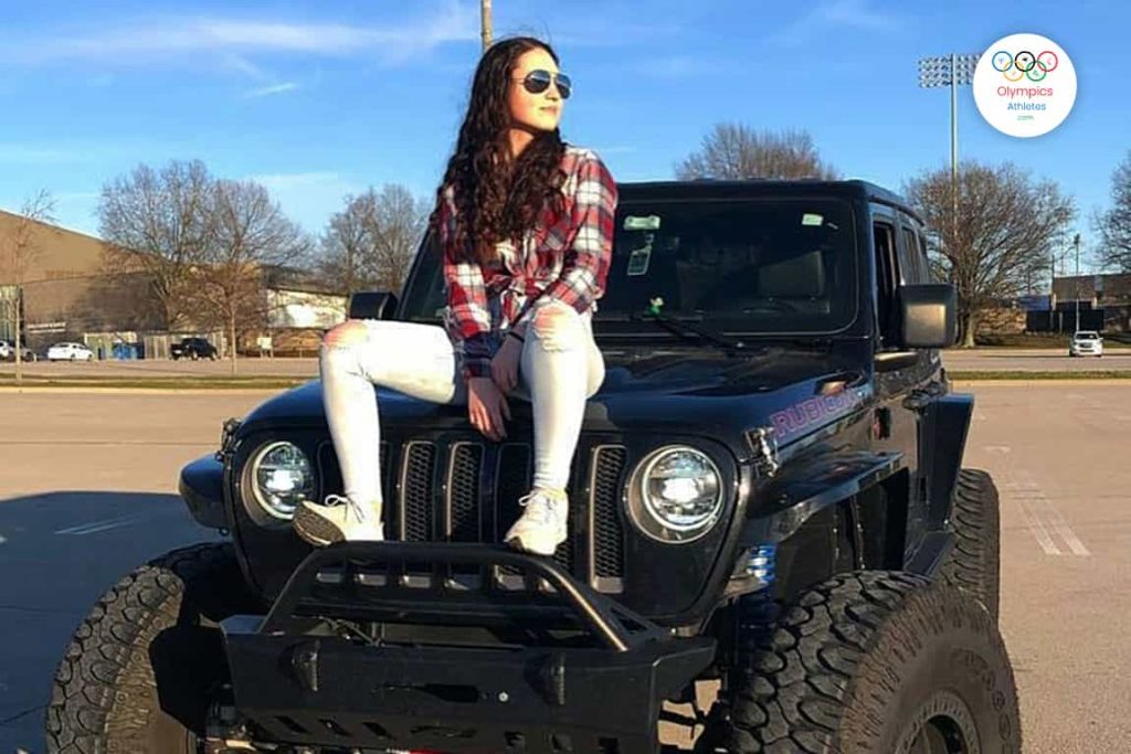 Mary Tucker with her Jeep