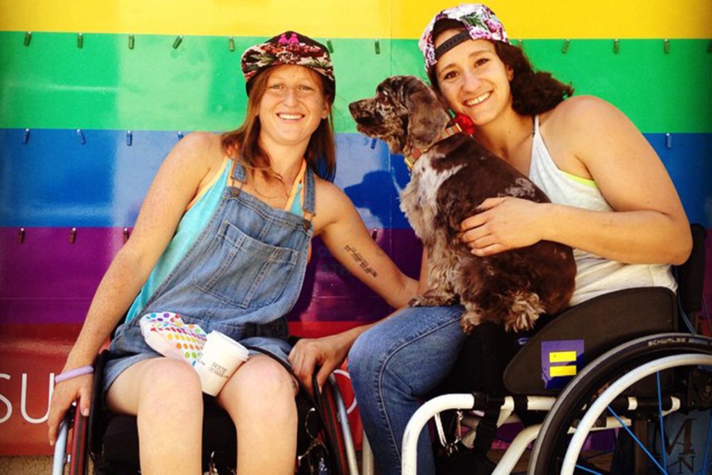 Courtney with her partner Molly Bloom in LGBTQ Parade